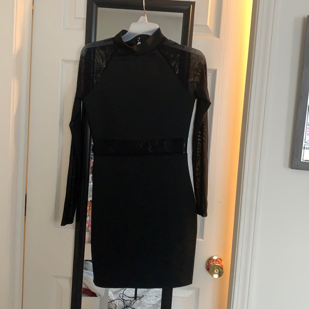 Little black dress with mesh cutout and sleeves